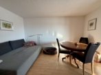 Wohnzimmer OG - Sehr gepflegtes Zweifamilienhaus mit freiem Bergblick & moderner Haustechnik in ruhiger Lage