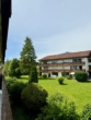 Ruhiger Ausblick auf die gepflegte Wohnanlage