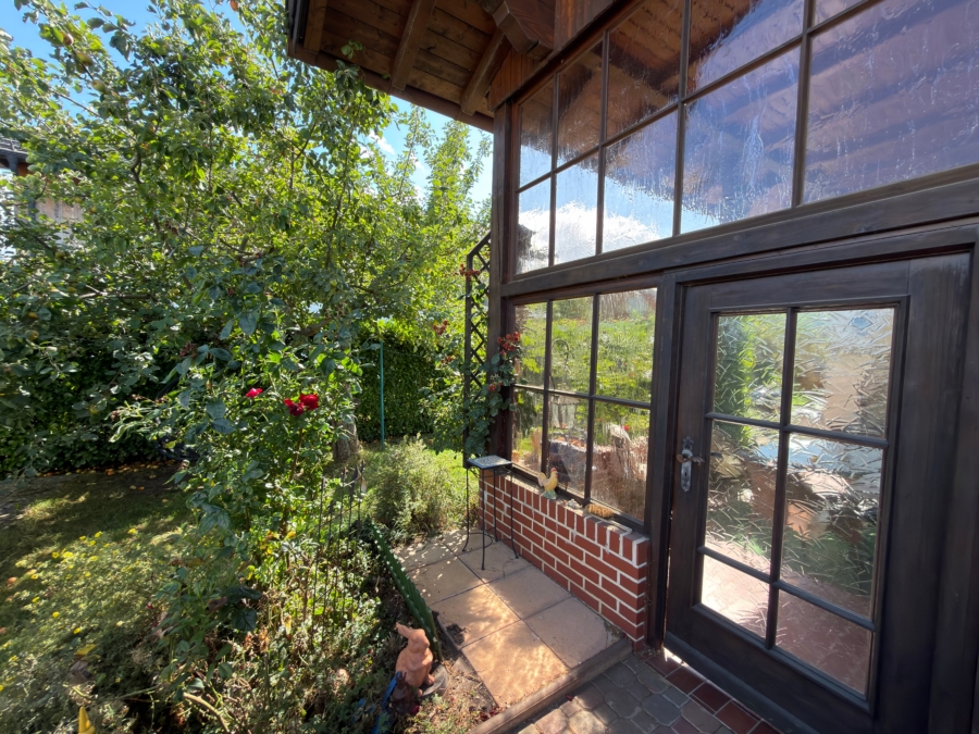 Verglaste und überdachte Terrasse