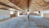Lichtdurchflutete Reit- und Bewegungshalle