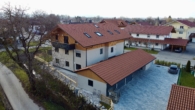 Luftaufnahme - Neubau: Traumhaft lichtdurchflutete vier Zimmer Erdgeschosswohnung in Übersee Feldwies