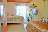 OG Schlafzimmer - Landhaus mit Mieteinnahmen in Bernau am Chiemsee