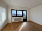 Wohnzimmer - Sonnige 2 Zi. Whg. mit Bergblick 1 OG und kleine Zusatzwohnung im Souterrain